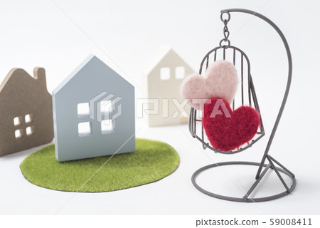 Image of couple dreaming of detached house Image of couple dreaming of detached house 59008411