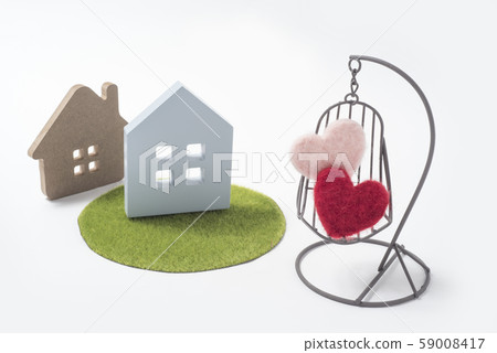 Image of couple dreaming of detached house Image of couple dreaming of detached house 59008417