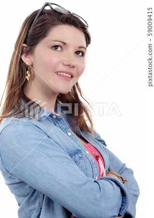 Young woman in jeans jacket with glasses 59009415