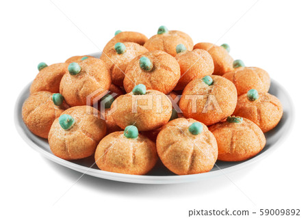 small pumpkin marmalade for the holiday of Halloween in the plate small pumpkin marmalade for the holiday of Halloween in the plate 59009892