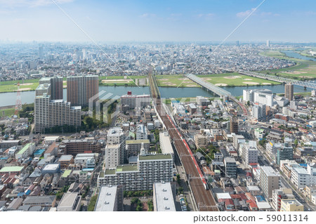 Urban landscape Buildings and residential area, view from Ichikawa City, Chiba Prefecture, towards Katsushika Ward, Tokyo Urban landscape Buildings and residential area, view from Ichikawa City, Chiba Prefecture, towards Katsushika Ward, Tokyo 59011314