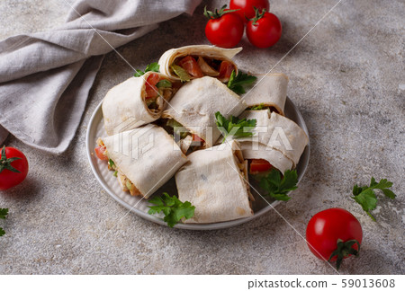 Lavash rolls with chicken and vegetables Lavash rolls with chicken and vegetables 59013608