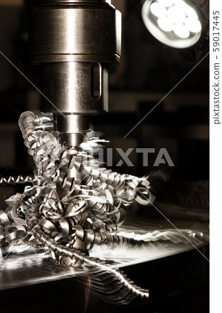 drilling holes in metal on industrial equipment 59017445