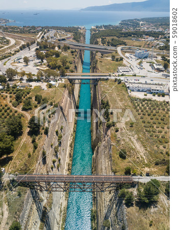 Aerial bird's eye view photo taken by drone of famous Corinth Canal with turquoise water 59018602