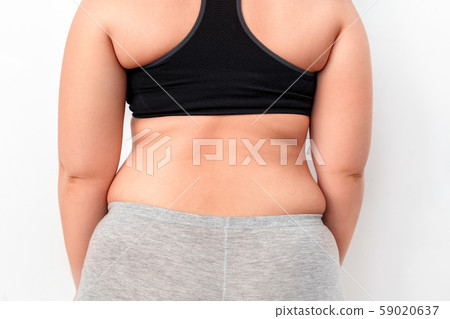 Body Care. Chubby girl standing isolated on white showing back close-up Body Care. Chubby girl standing isolated on white showing back close-up 59020637