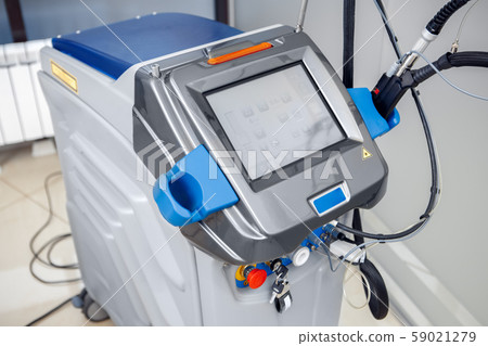 Cosmetology Service. Revolutionizing dynamic laser for hair removal device in clinic display close Cosmetology Service. Revolutionizing dynamic laser for hair removal device in clinic display close 59021279