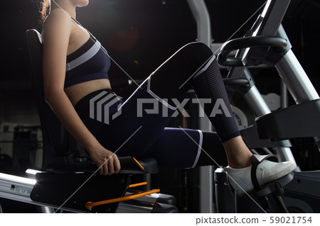 Muscular fitness woman exercises healthy lifestyle Muscular fitness woman exercises healthy lifestyle 59021754