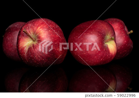 Red delicious apple isolated on black glass Red delicious apple isolated on black glass 59022996