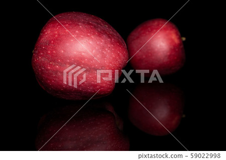 Red delicious apple isolated on black glass Red delicious apple isolated on black glass 59022998