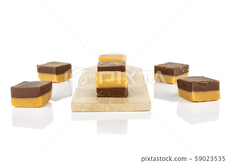 Caramel chocolate candy isolated on white Caramel chocolate candy isolated on white 59023535