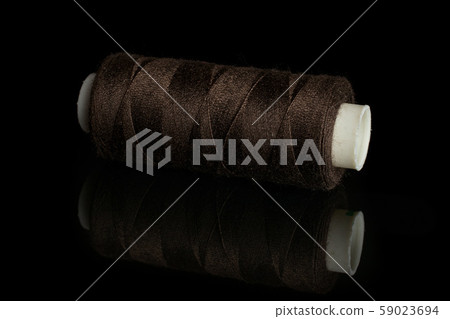 Haberdashery item isolated on black glass Haberdashery item isolated on black glass 59023694