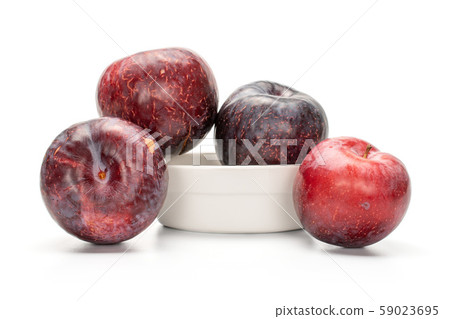 Fresh red plum isolated on white 59023695