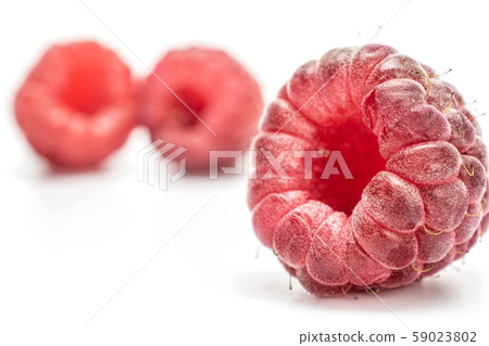 Fresh crimson raspberry isolated on white Fresh crimson raspberry isolated on white 59023802