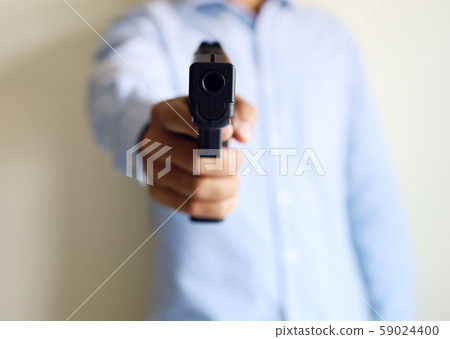 Close-up Man holding gunman concept. 59024400