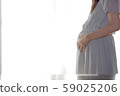 Pregnant woman 59025206