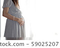 Pregnant woman 59025207