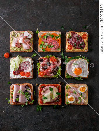 open sandwiches with different meat, copy space 59025426