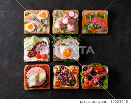 open sandwiches with different meat, copy space 59025446