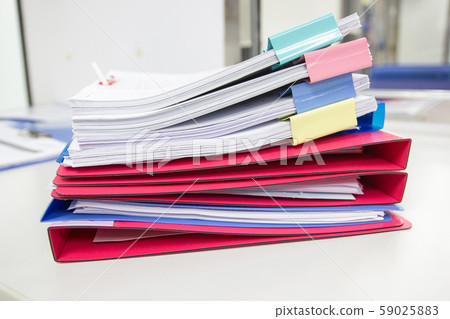 file folder and Stack of business report paper 59025883