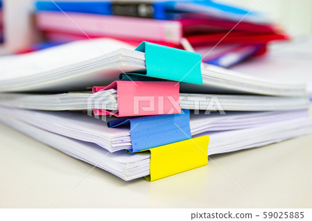 file folder and Stack of business report paper 59025885