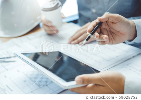 Engineer meeting for architectural with tablet Engineer meeting for architectural with tablet 59028752