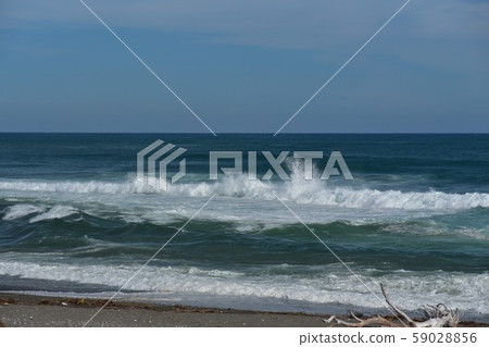 Surf spot wave on the Niigawa river mouth coast, Tosa City, Kochi Prefecture 59028856