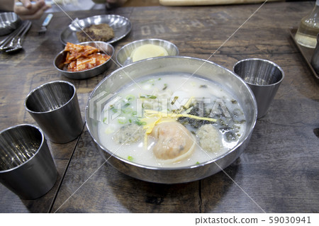 Dumpling soup ordered at a restaurant 59030941