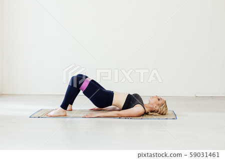 Woman blonde in sports with fitness gum Woman blonde in sports with fitness gum 59031461