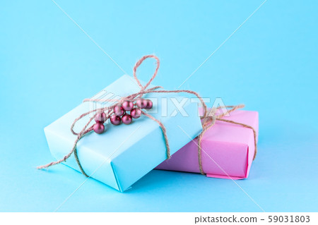 Two gift boxes of pink and blue. Place for text. 59031803