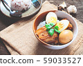 Stewed eggs and pork or eggs and pork in brown 59033527