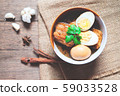 Stewed eggs and pork or eggs and pork in brown 59033528