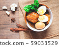 Stewed eggs and pork or eggs and pork in brown 59033529