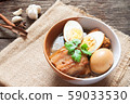 Stewed eggs and pork or eggs and pork in brown 59033530