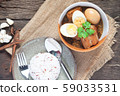 Stewed eggs and pork or eggs and pork in brown 59033531