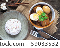 Stewed eggs and pork or eggs and pork in brown 59033532