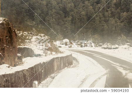 Himalayan mountain road in winter. Leh Manali Highway, Jammu and Kashmir, India 59034193