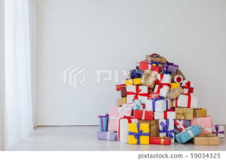 lots of different birthday gifts New Year Christmas on a white background 59034325