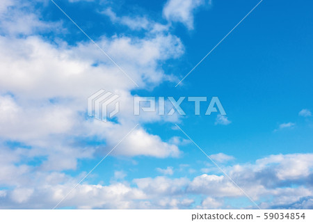 puffy clouds on the blue winter sky puffy clouds on the blue winter sky 59034854