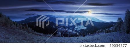 panorama of a mountain ridge at night panorama of a mountain ridge at night 59034877