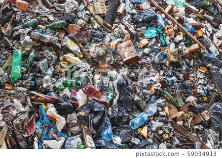 Background of garbage waste with a huge amount of used packaging from household products and food Background of garbage waste with a huge amount of used packaging from household products and food 59034913