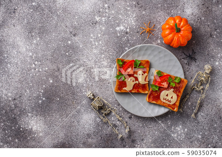 Halloween sandwiches toasts with ghost and pumpkin Halloween sandwiches toasts with ghost and pumpkin 59035074