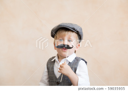 Happy child playing in home Happy child playing in home 59035935