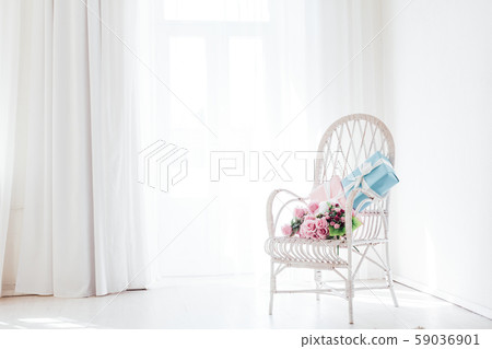 white vintage chair in the interior of an empty white room white vintage chair in the interior of an empty white room 59036901