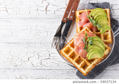 Keto cheese waffle with avocado Keto cheese waffle with avocado 59037134