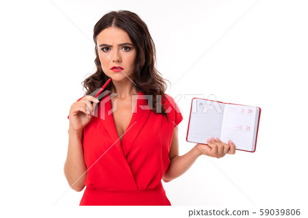 business brunette thought on a white background with a notebook and a pencil in her hands, a girl in business brunette thought on a white background with a notebook and a pencil in her hands, a girl in 59039806