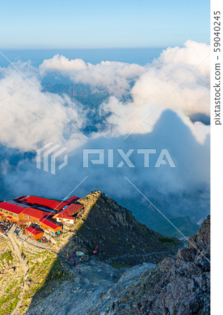 Mt. Kasumigadake hut and head shadow Mt. Kasumigadake hut and head shadow 59040245