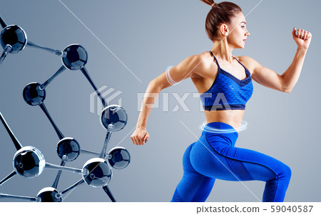 Athletic woman standing near glass molecule chain. Athletic woman standing near glass molecule chain. 59040587