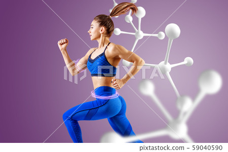Sporty young woman runing and jumping near molecules. Sporty young woman runing and jumping near molecules. 59040590