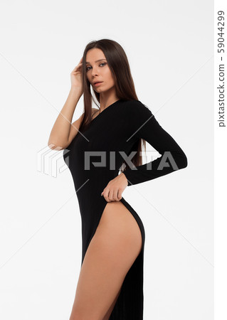 Slim woman in black dress Slim woman in black dress 59044299