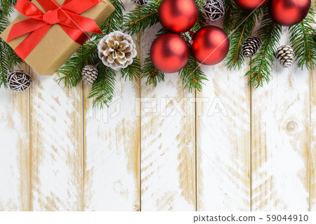 Christmas decorations, gift box and red balls on a 59044910